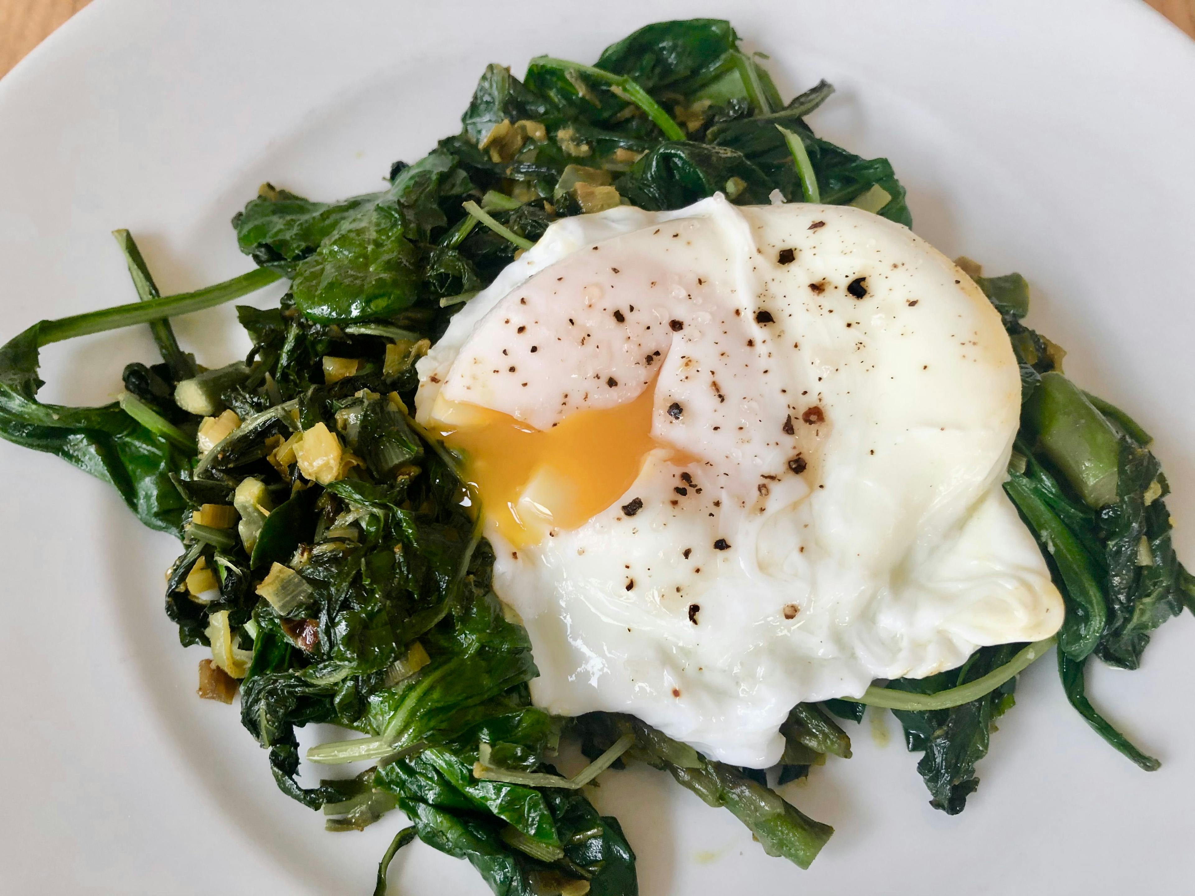 spring greens  with  poached eggs